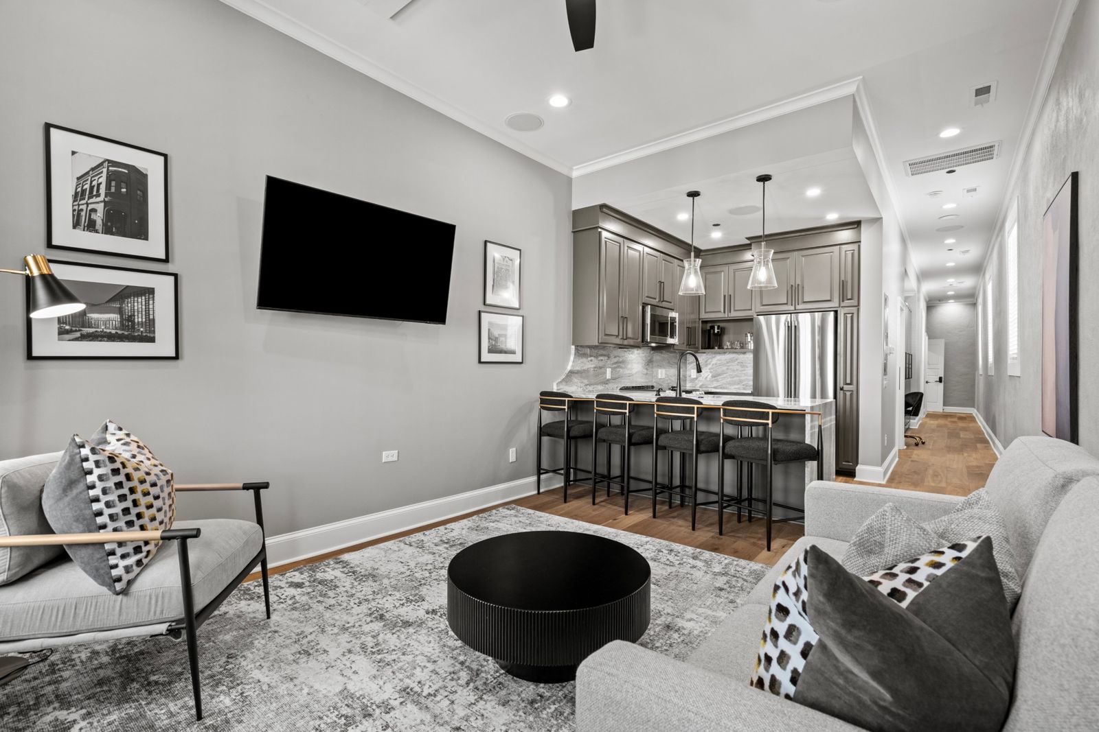Noir Suite living room looking toward the kitchen