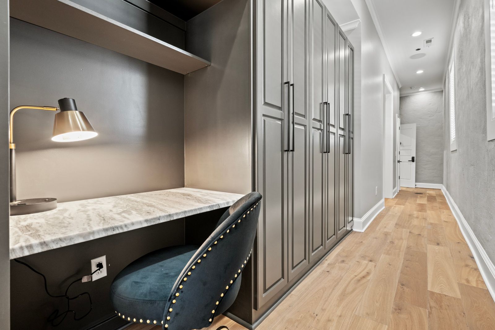 Noir Suite hallway workspace and wardrobes